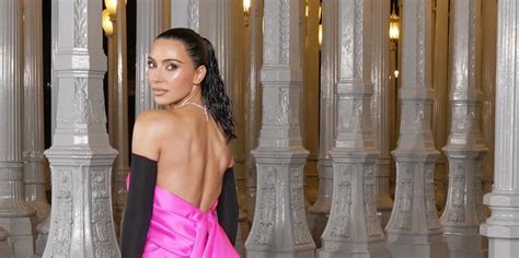 Kim Kardashian is giving princess energy in backless .